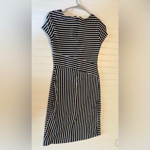 Size 4 Banana Republic stripped women’s dress mid length form fitting .